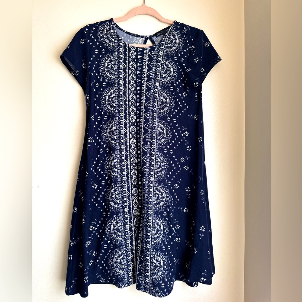A Derek Hart blue patterned dress.